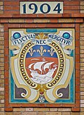 Coat of arms of Paris on the wall of a building in the 5e arrondissement