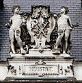 Escutcheon representing the industry, on the back of the Hôtel de Ville de Paris